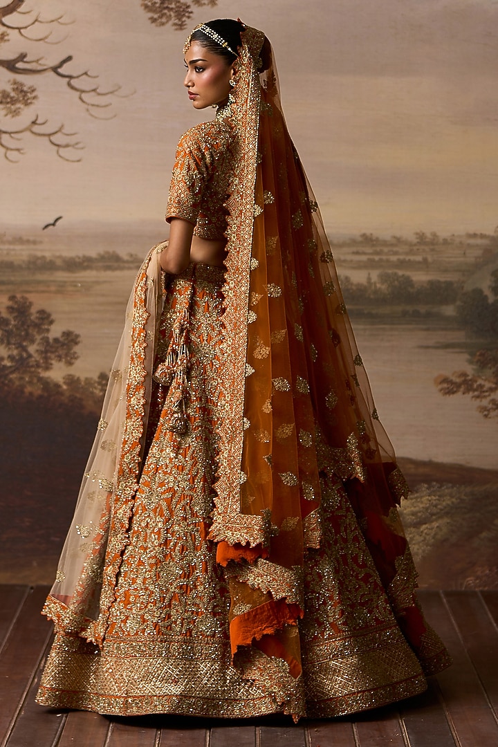 Rust Raw Silk Embroidered Bridal Lehenga Set by Angad Singh at Pernia's Pop Up Shop