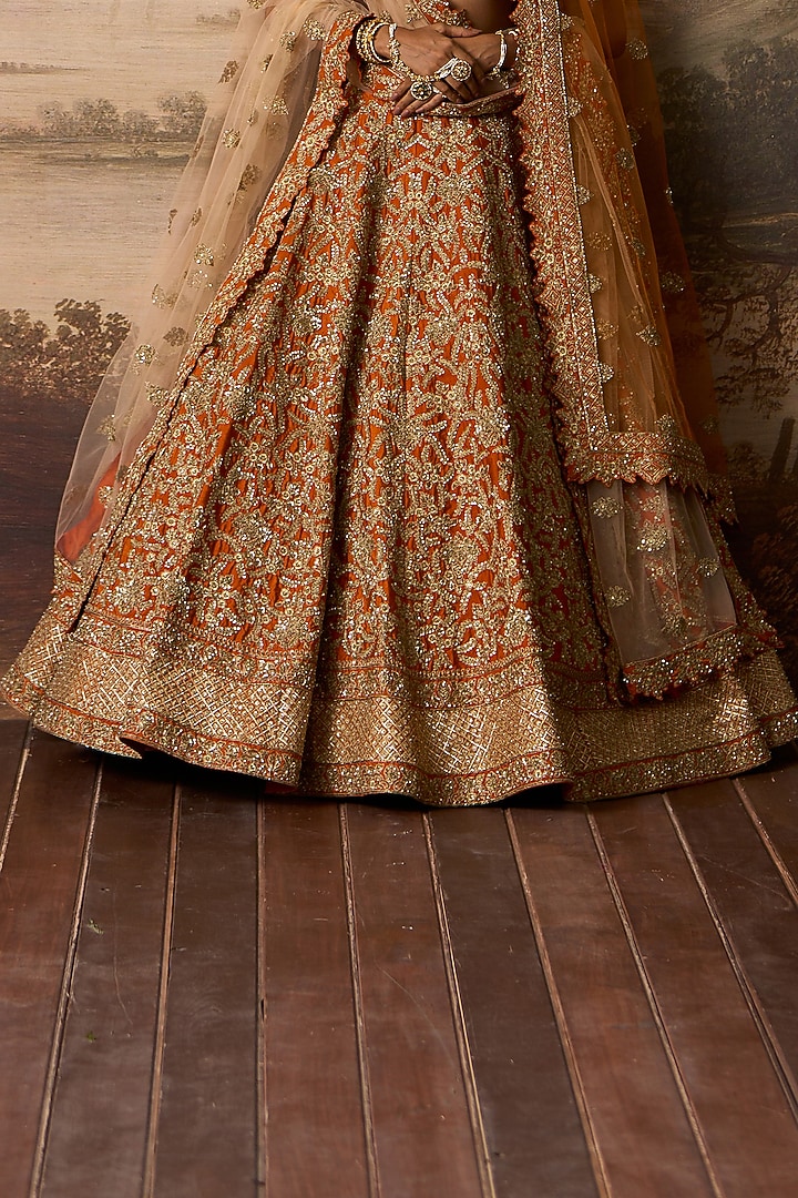 Rust Raw Silk Embroidered Bridal Lehenga Set by Angad Singh at Pernia's Pop Up Shop