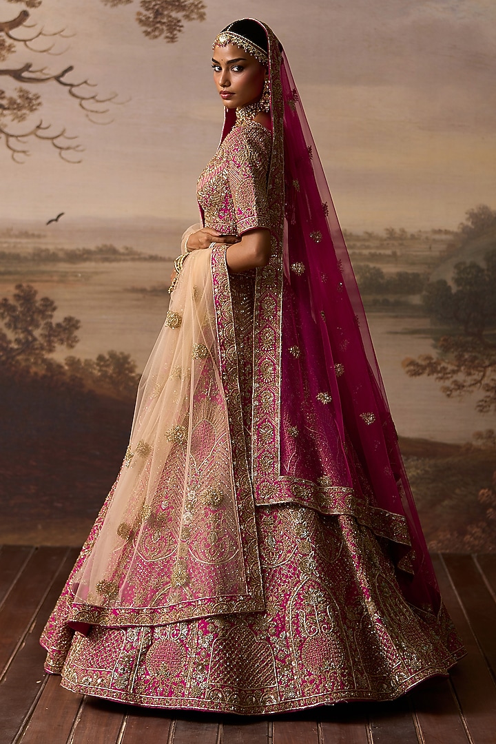 Rani Pink Raw Silk Paisley Embroidered Bridal Lehenga Set by Angad Singh at Pernia's Pop Up Shop
