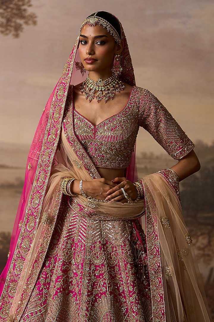 Rani Pink Raw Silk Paisley Embroidered Bridal Lehenga Set by Angad Singh at Pernia's Pop Up Shop