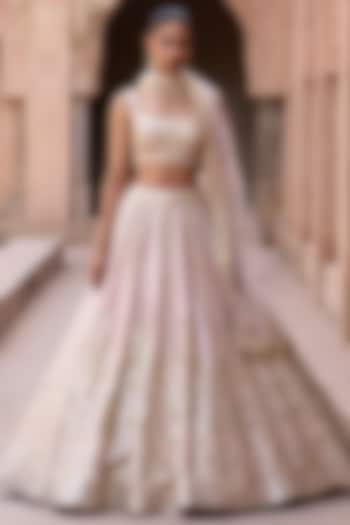Soft Peach Raw Silk Mirror Work Wedding Lehenga Set by Angad Singh at Pernia's Pop Up Shop