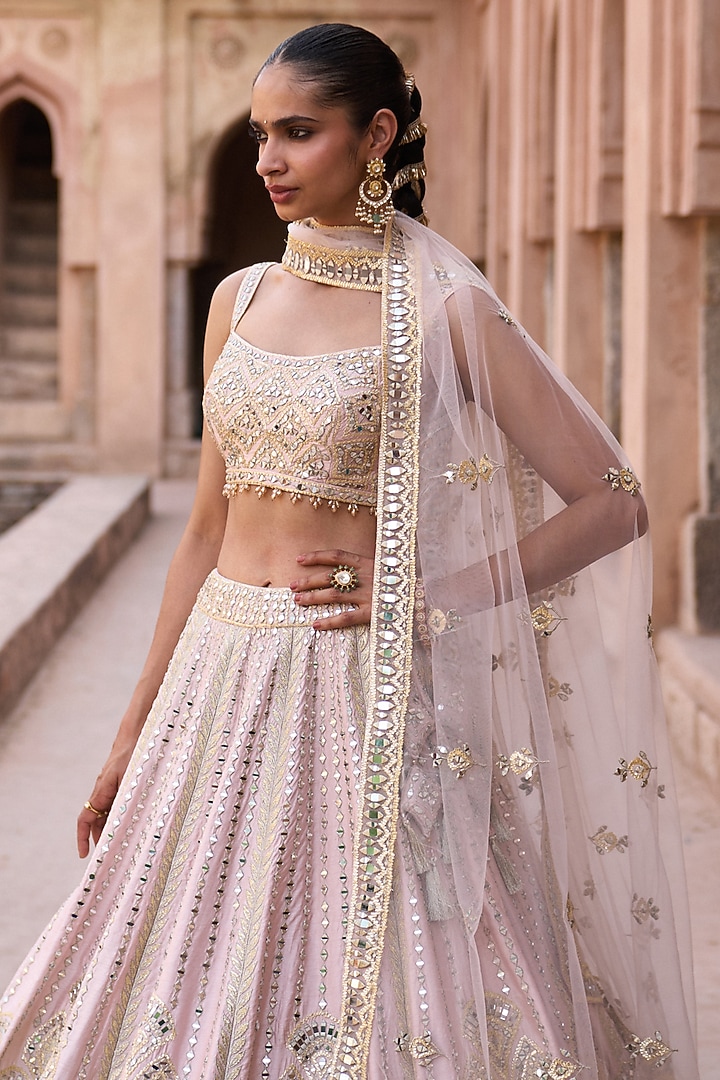 Soft Peach Raw Silk Mirror Work Wedding Lehenga Set by Angad Singh at Pernia's Pop Up Shop