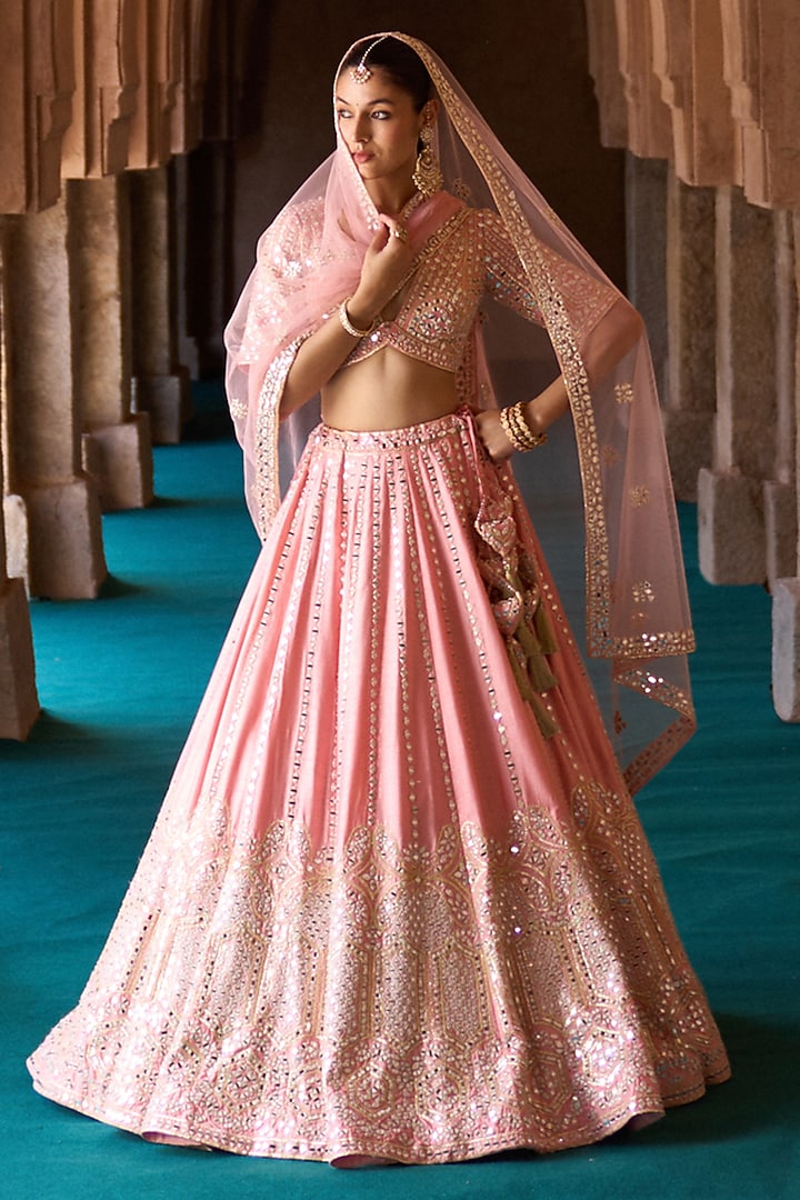 Carrot Pink Raw Silk Mirror Embellished Wedding Lehenga Set by Angad Singh at Pernia's Pop Up Shop