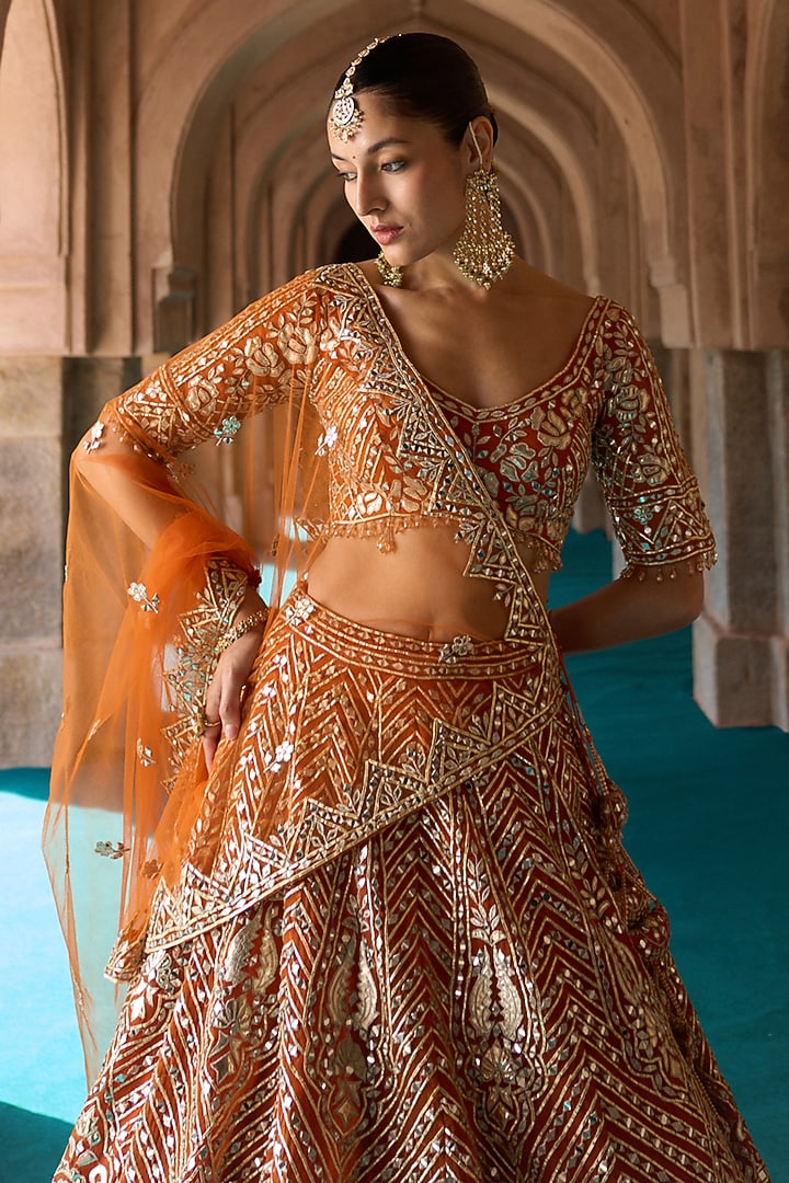 Rust Organza Mirror Work Bridal Lehenga Set by Angad Singh at Pernia's Pop Up Shop