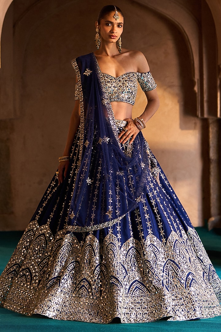 Navy Blue Raw Silk Mirror Work Bridal Lehenga Set by Angad Singh at Pernia's Pop Up Shop