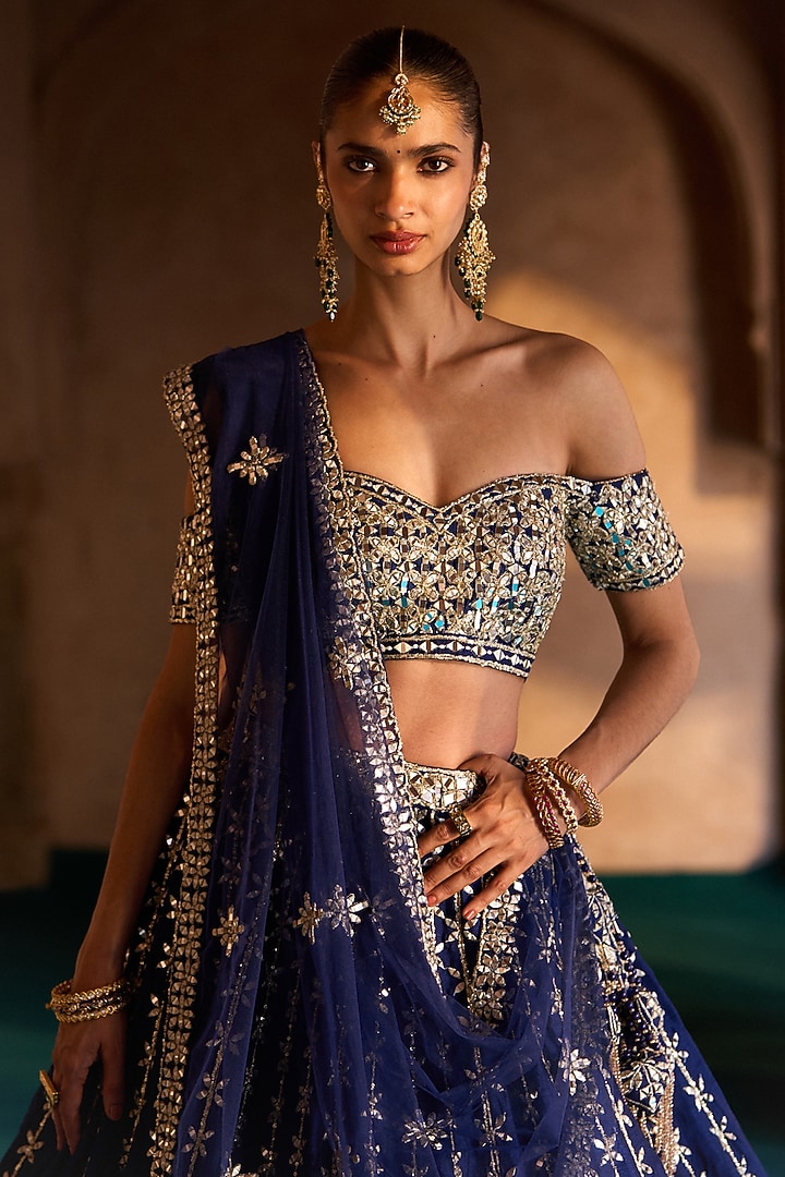 Navy Blue Raw Silk Mirror Work Bridal Lehenga Set by Angad Singh at Pernia's Pop Up Shop