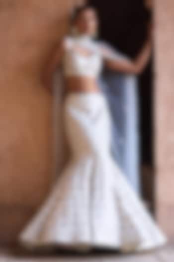 Ivory Raw Silk Mirror Work Bridal Lehenga Set by Angad Singh at Pernia's Pop Up Shop