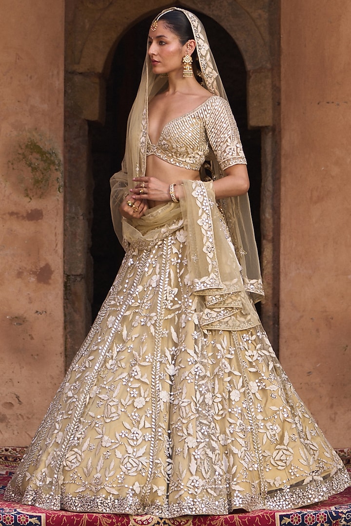 Golden Beige Net Floral Embroidered Bridal Lehenga Set by Angad Singh at Pernia's Pop Up Shop