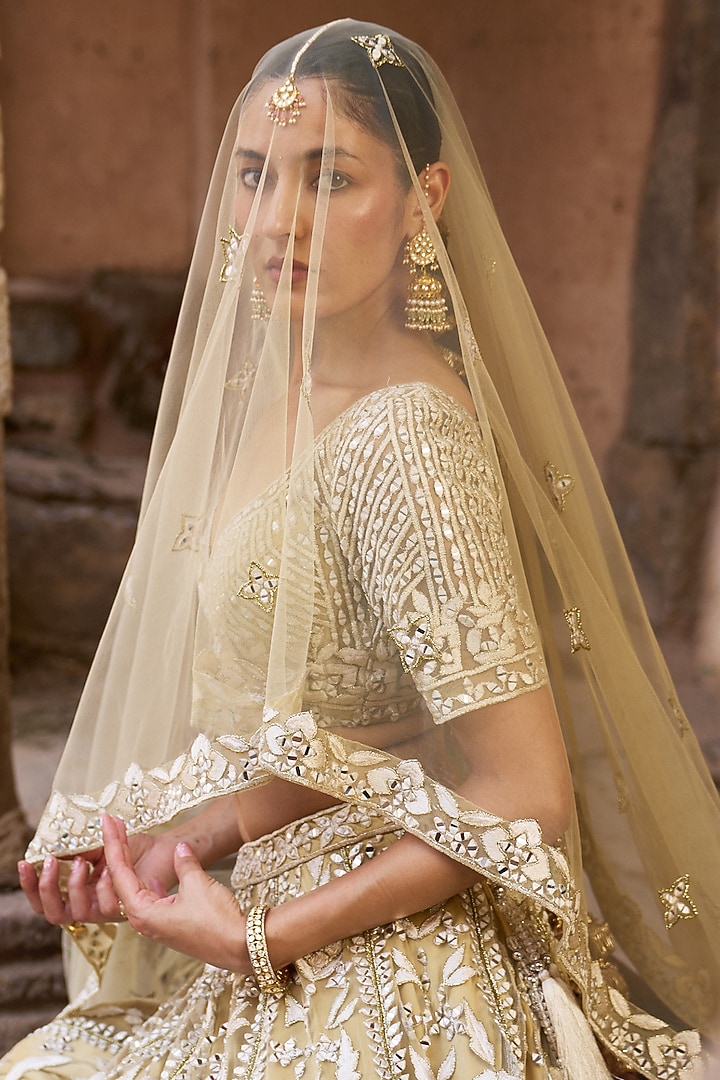 Golden Beige Net Floral Embroidered Bridal Lehenga Set by Angad Singh at Pernia's Pop Up Shop