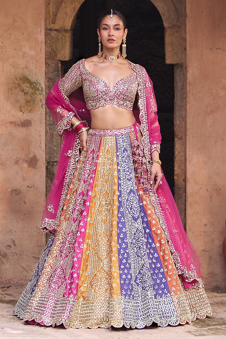 Multi-Colored Raw Silk Mirror Work Bridal Lehenga Set by Angad Singh at Pernia's Pop Up Shop