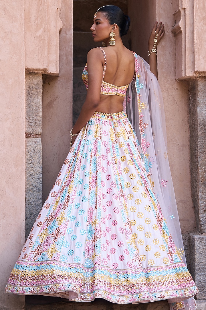 Blush Pink Raw Silk Mirror Embellished Bridal Lehenga Set by Angad Singh at Pernia's Pop Up Shop