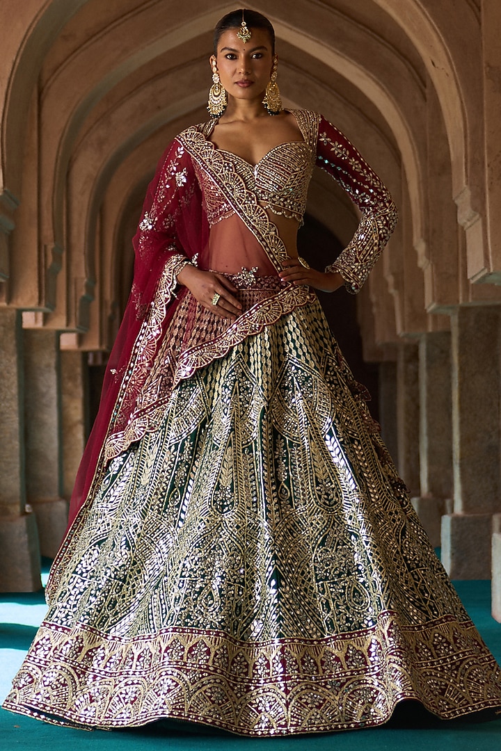 Bottle Green Raw Silk Mirror Embroidered Bridal Lehenga Set by Angad Singh at Pernia's Pop Up Shop