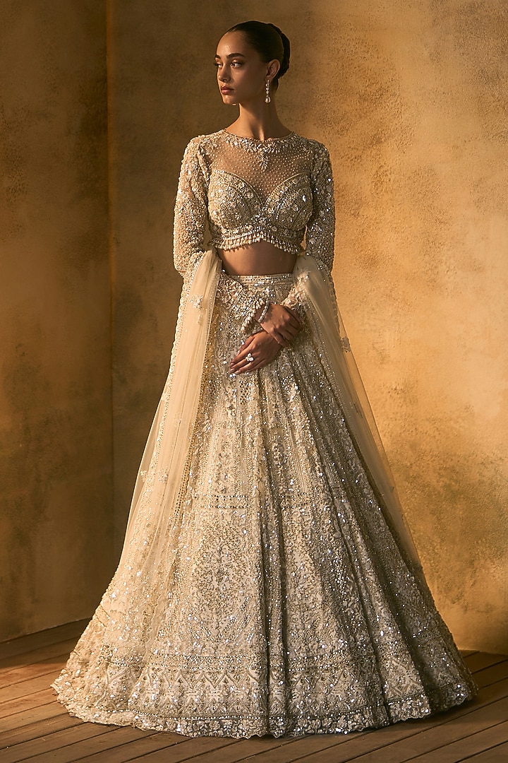 Dusty Ivory Net Embroidered Bridal Bridal Lehenga Set by Angad Singh at Pernia's Pop Up Shop