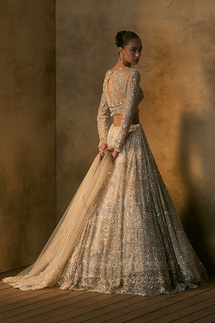 Dusty Ivory Net Embroidered Bridal Bridal Lehenga Set by Angad Singh at Pernia's Pop Up Shop