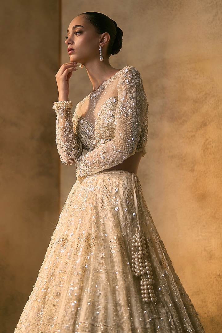 Dusty Ivory Net Embroidered Bridal Bridal Lehenga Set by Angad Singh at Pernia's Pop Up Shop