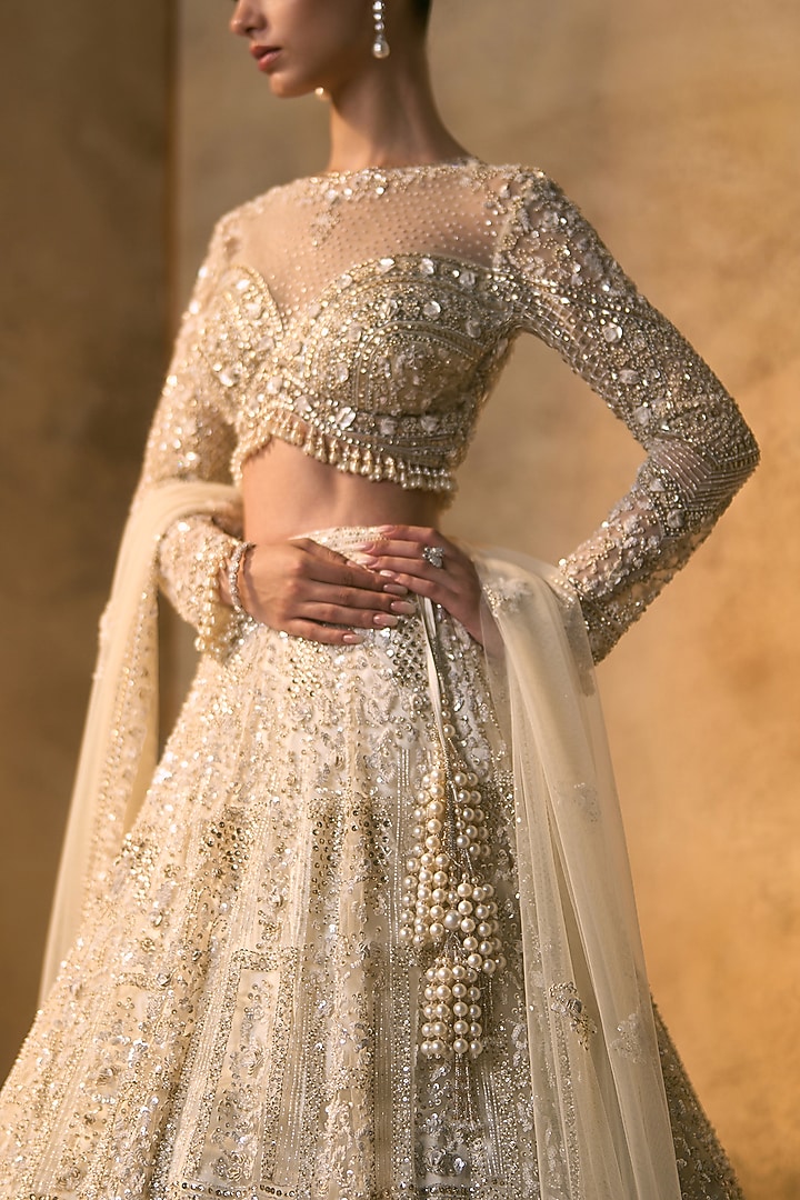 Dusty Ivory Net Embroidered Bridal Bridal Lehenga Set by Angad Singh at Pernia's Pop Up Shop