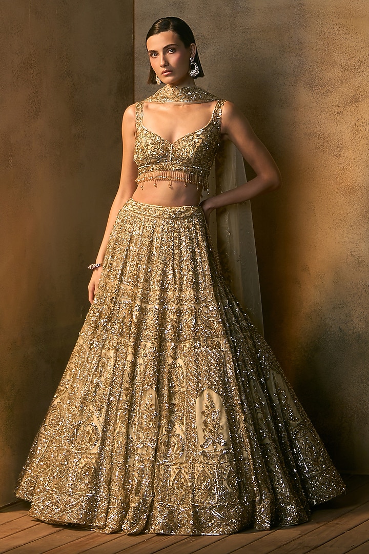 Gold Net Embroidered Bridal Bridal Lehenga Set by Angad Singh at Pernia's Pop Up Shop
