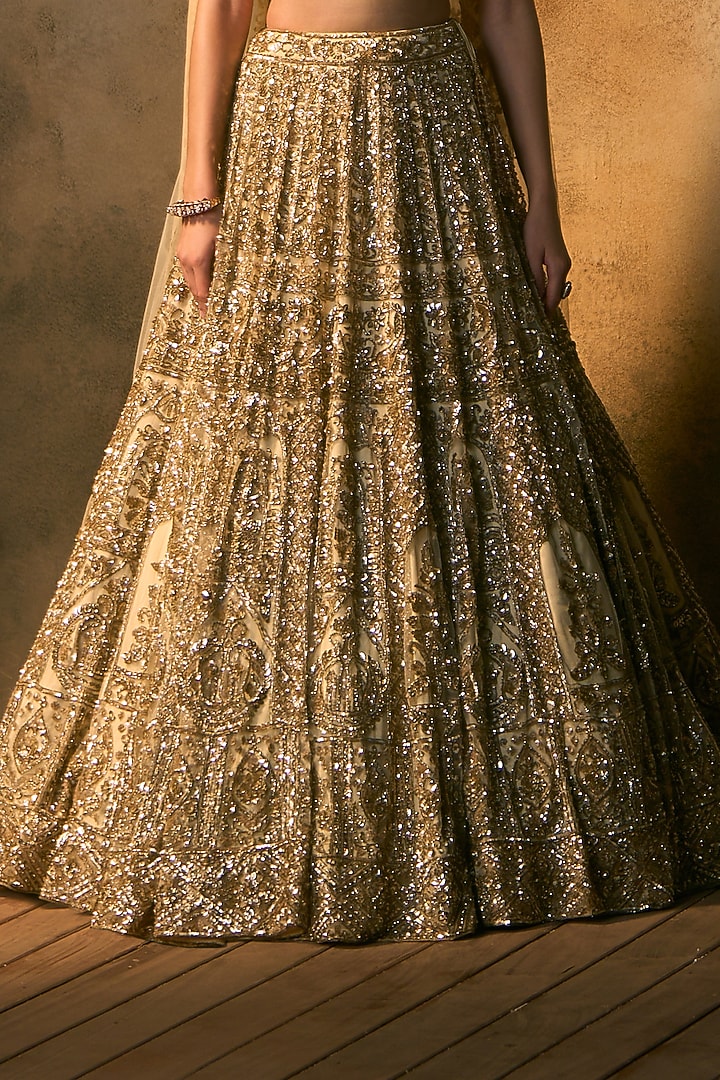 Gold Net Embroidered Bridal Bridal Lehenga Set by Angad Singh at Pernia's Pop Up Shop
