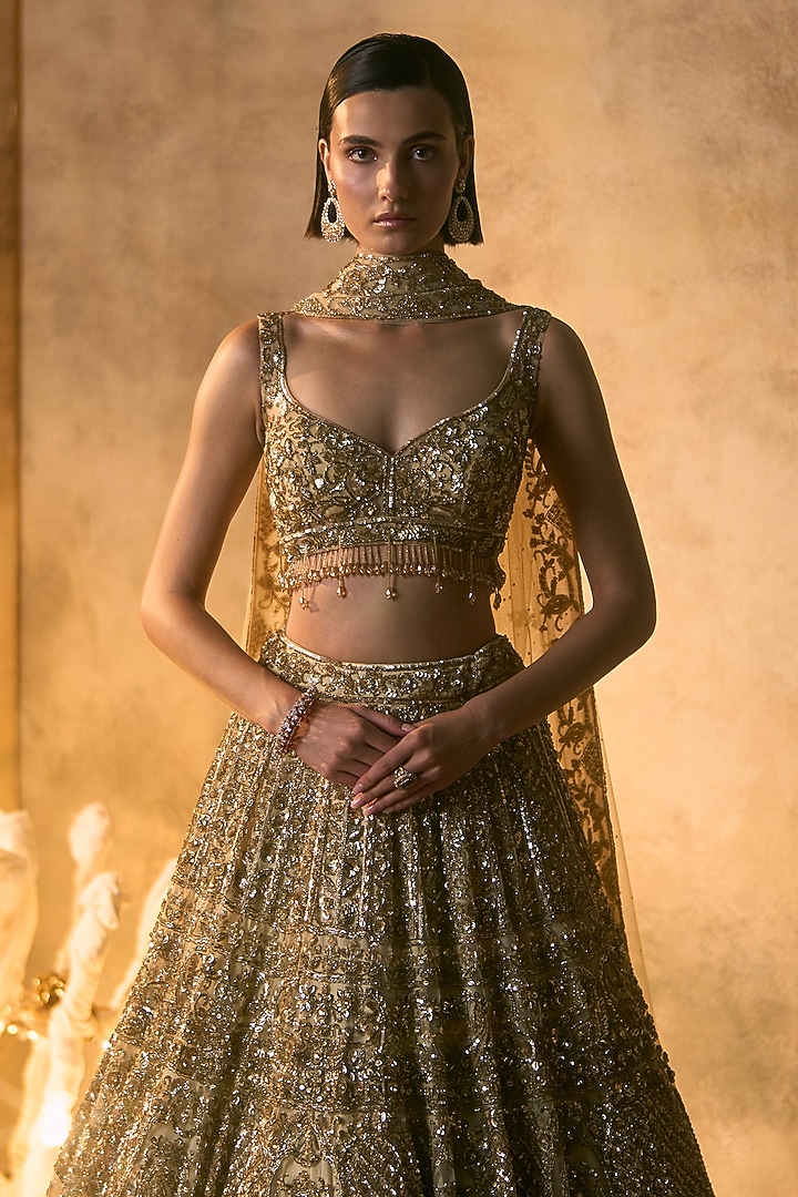 Gold Net Embroidered Bridal Bridal Lehenga Set by Angad Singh at Pernia's Pop Up Shop