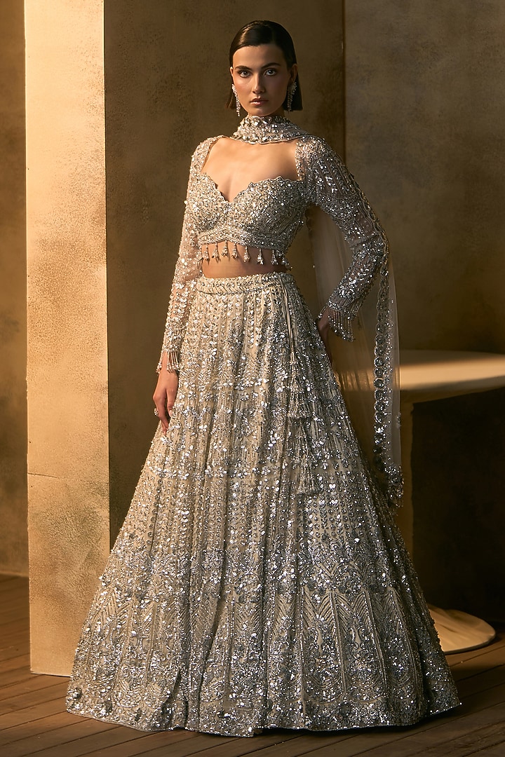 Ivory Net Silver Embroidered Bridal Bridal Lehenga Set by Angad Singh at Pernia's Pop Up Shop