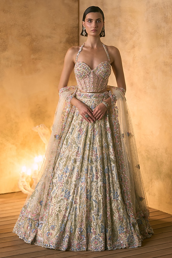 Ivory Net Sequin & Crystal Embroidered Bridal Bridal Lehenga Set by Angad Singh at Pernia's Pop Up Shop