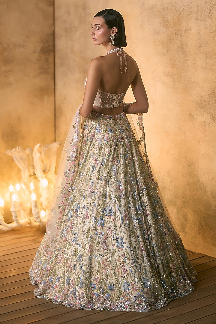 Ivory Net Sequin & Crystal Embroidered Bridal Bridal Lehenga Set by Angad Singh at Pernia's Pop Up Shop