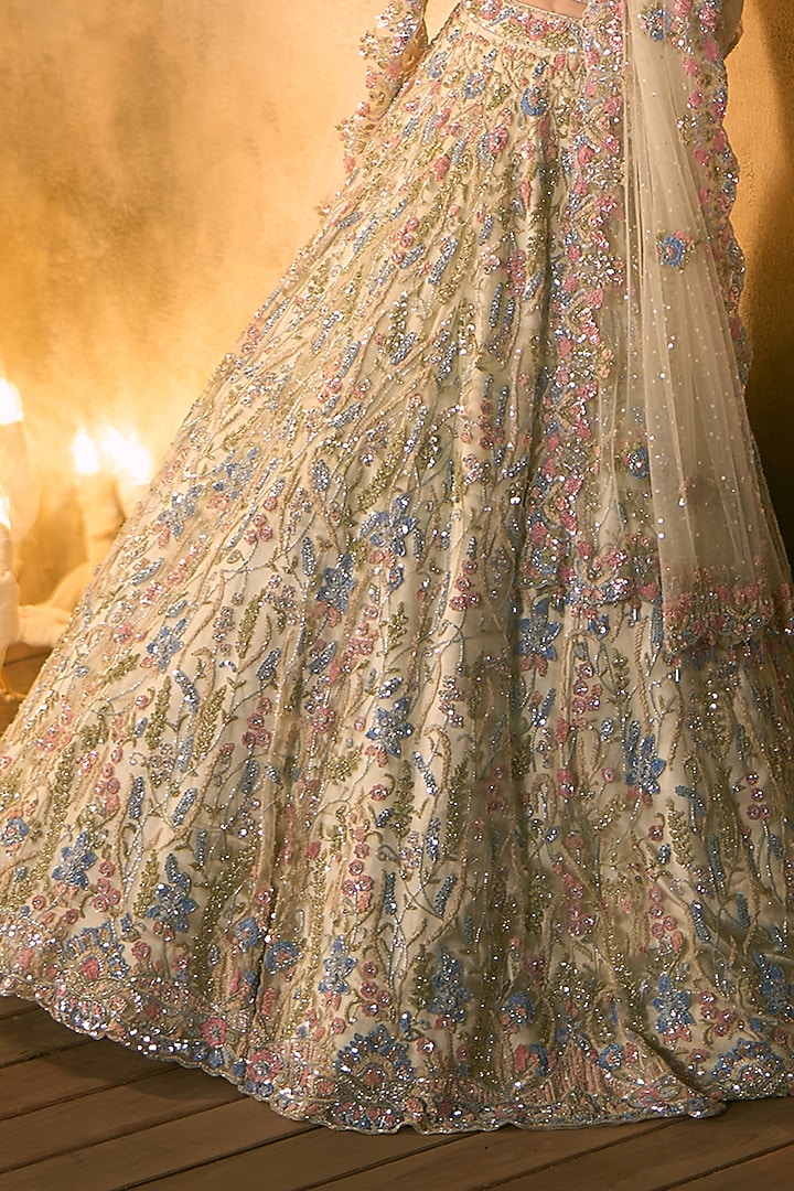 Ivory Net Sequin & Crystal Embroidered Bridal Bridal Lehenga Set by Angad Singh at Pernia's Pop Up Shop