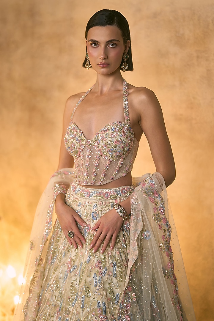 Ivory Net Sequin & Crystal Embroidered Bridal Bridal Lehenga Set by Angad Singh at Pernia's Pop Up Shop