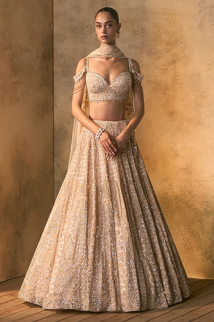 Peach Net Crystal Embroidered Bridal Bridal Lehenga Set by Angad Singh at Pernia's Pop Up Shop