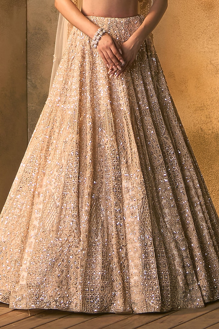 Peach Net Crystal Embroidered Bridal Bridal Lehenga Set by Angad Singh at Pernia's Pop Up Shop