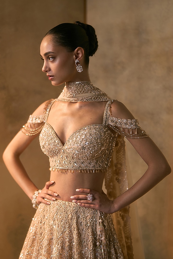 Peach Net Crystal Embroidered Bridal Bridal Lehenga Set by Angad Singh at Pernia's Pop Up Shop