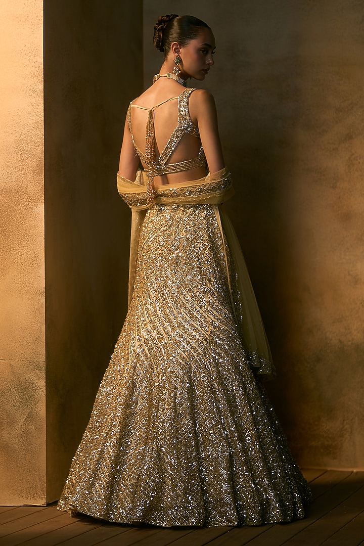 Gold Net Sequin Embroidered Bridal Bridal Lehenga Set by Angad Singh at Pernia's Pop Up Shop