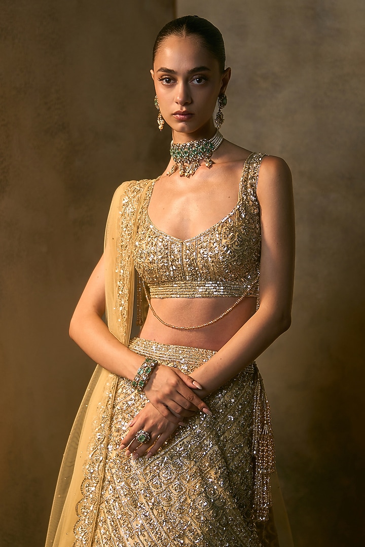 Gold Net Sequin Embroidered Bridal Bridal Lehenga Set by Angad Singh at Pernia's Pop Up Shop