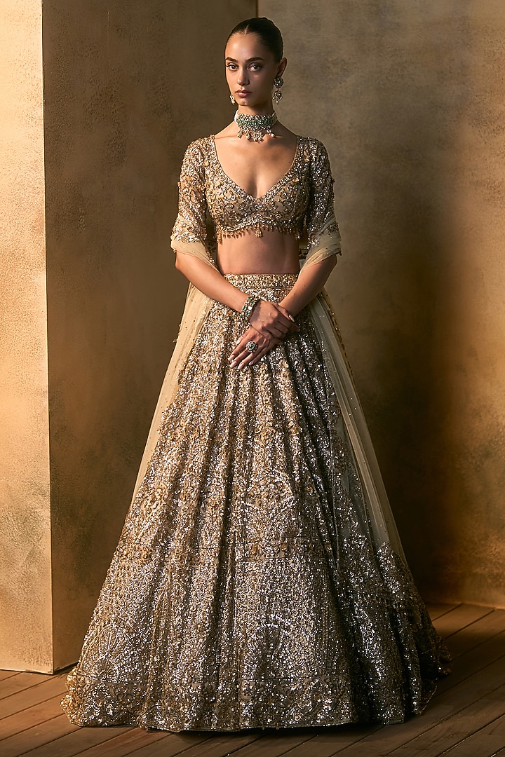 Antique Gold Net Sequin & Crystal Embroidered Bridal Bridal Lehenga Set by Angad Singh at Pernia's Pop Up Shop