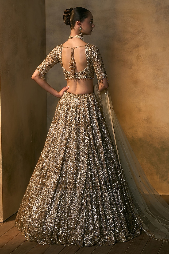 Antique Gold Net Sequin & Crystal Embroidered Bridal Bridal Lehenga Set by Angad Singh at Pernia's Pop Up Shop