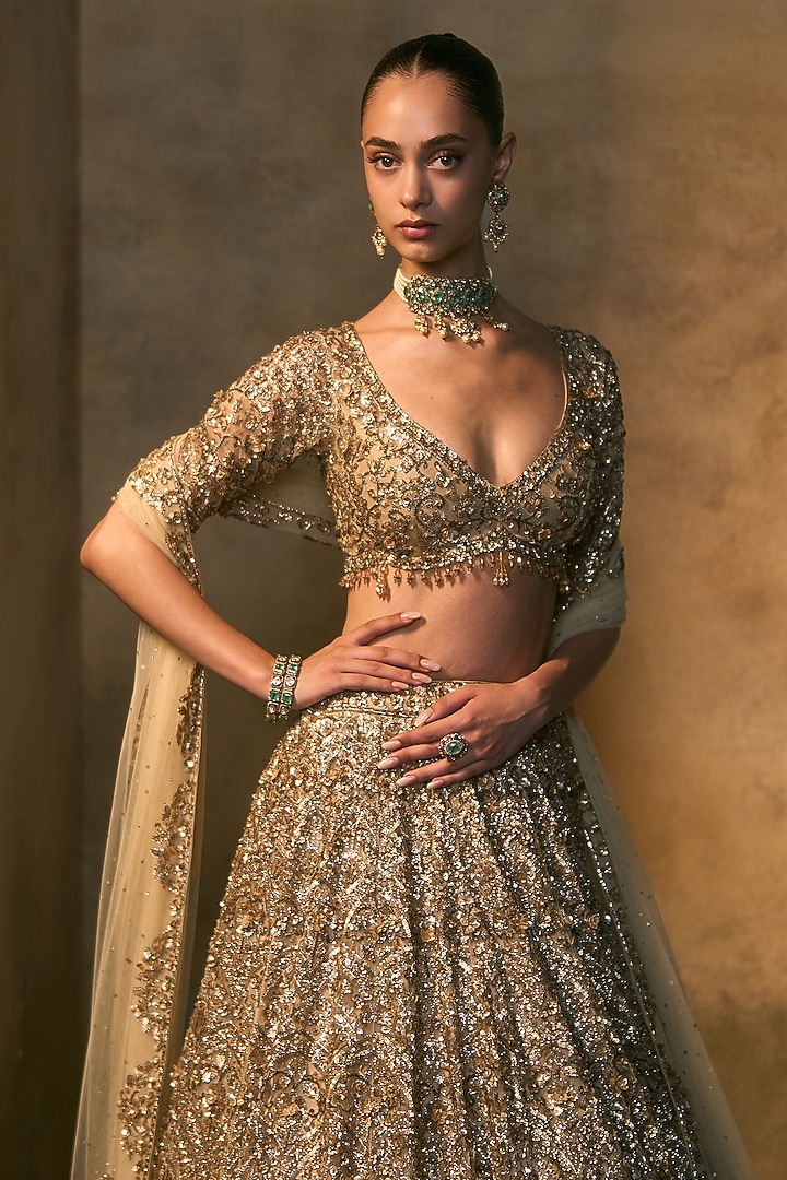 Antique Gold Net Sequin & Crystal Embroidered Bridal Bridal Lehenga Set by Angad Singh at Pernia's Pop Up Shop