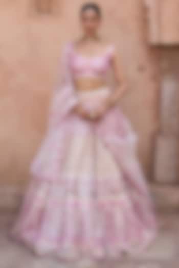 Ivory Net Mirror & Floral Embroidered Bridal Lehenga Set by Angad Singh at Pernia's Pop Up Shop