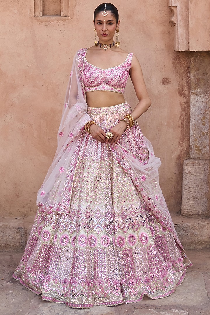 Ivory Net Mirror & Floral Embroidered Bridal Lehenga Set by Angad Singh at Pernia's Pop Up Shop