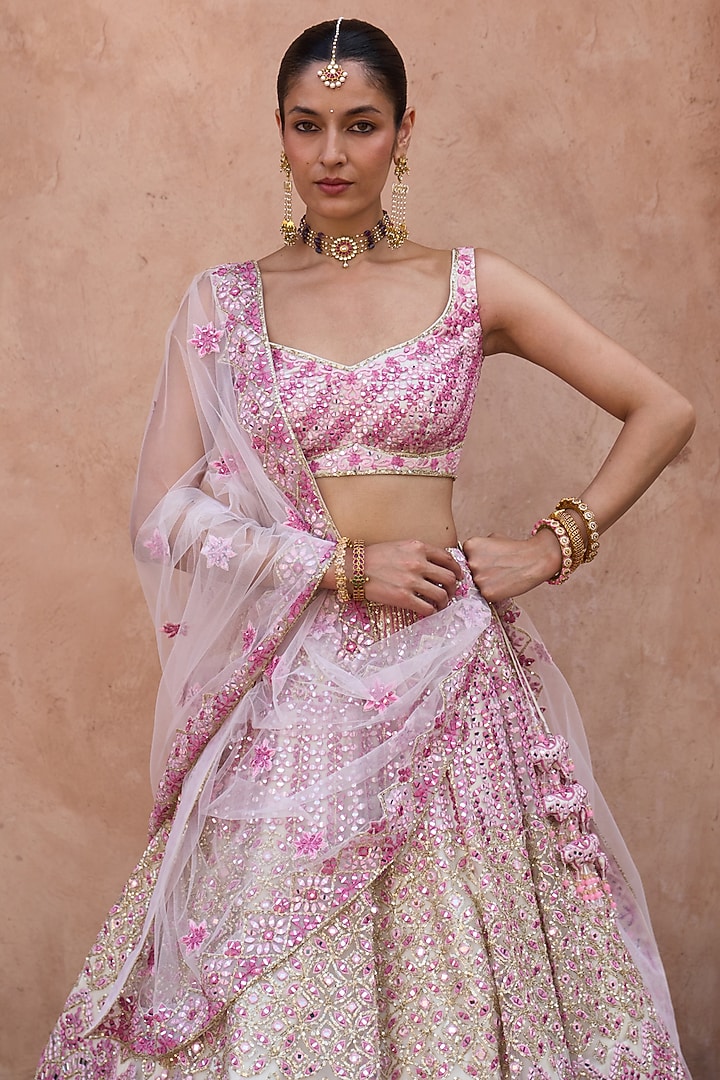 Ivory Net Mirror & Floral Embroidered Bridal Lehenga Set by Angad Singh at Pernia's Pop Up Shop