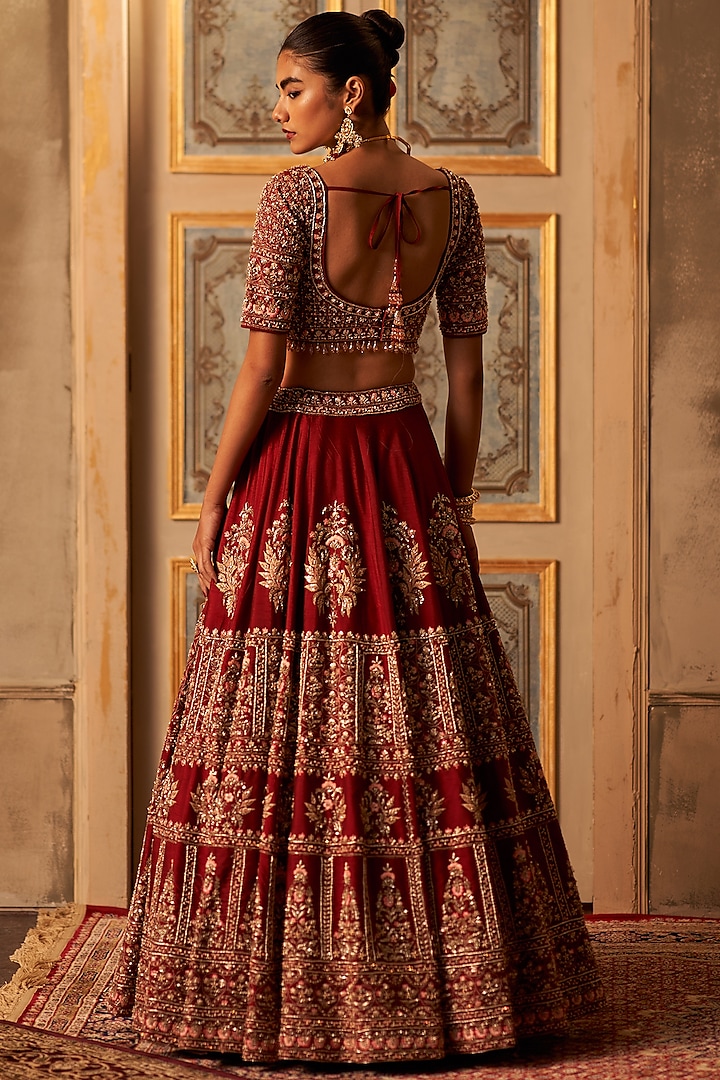 Maroon Raw Silk Embroidered Bridal Lehenga Set by Angad Singh at Pernia's Pop Up Shop