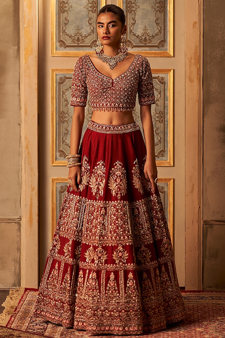 Maroon Raw Silk Embroidered Bridal Lehenga Set by Angad Singh at Pernia's Pop Up Shop