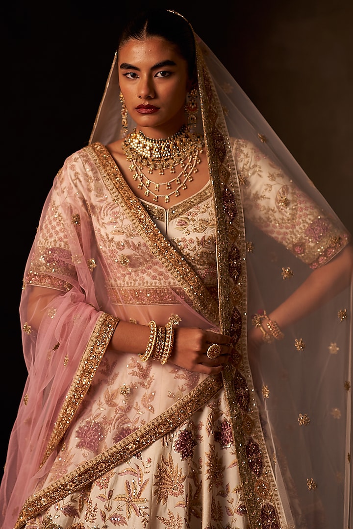 Ivory Raw Silk Embroidered Bridal Lehenga Set by Angad Singh at Pernia's Pop Up Shop