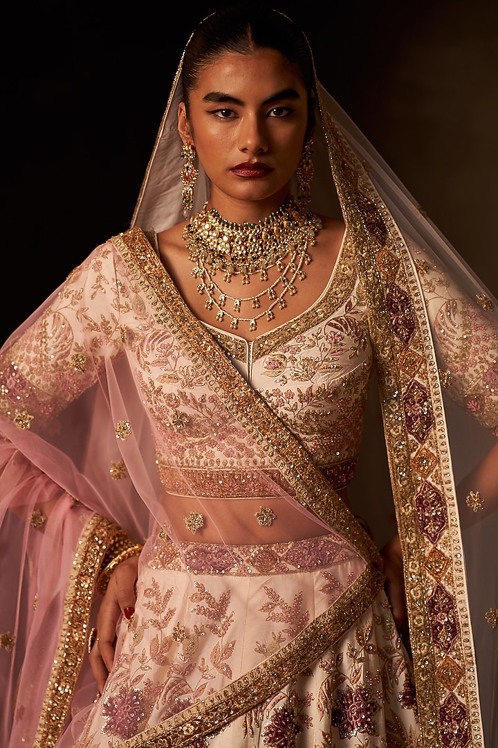 Ivory Raw Silk Embroidered Bridal Lehenga Set by Angad Singh at Pernia's Pop Up Shop