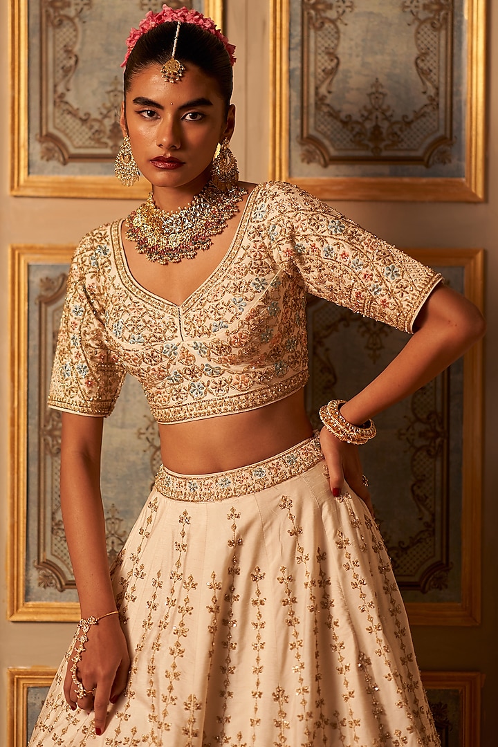 Ivory Raw Silk Embroidered Wedding Lehenga Set by Angad Singh at Pernia's Pop Up Shop