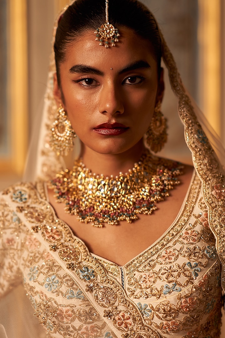 Ivory Raw Silk Embroidered Wedding Lehenga Set by Angad Singh at Pernia's Pop Up Shop