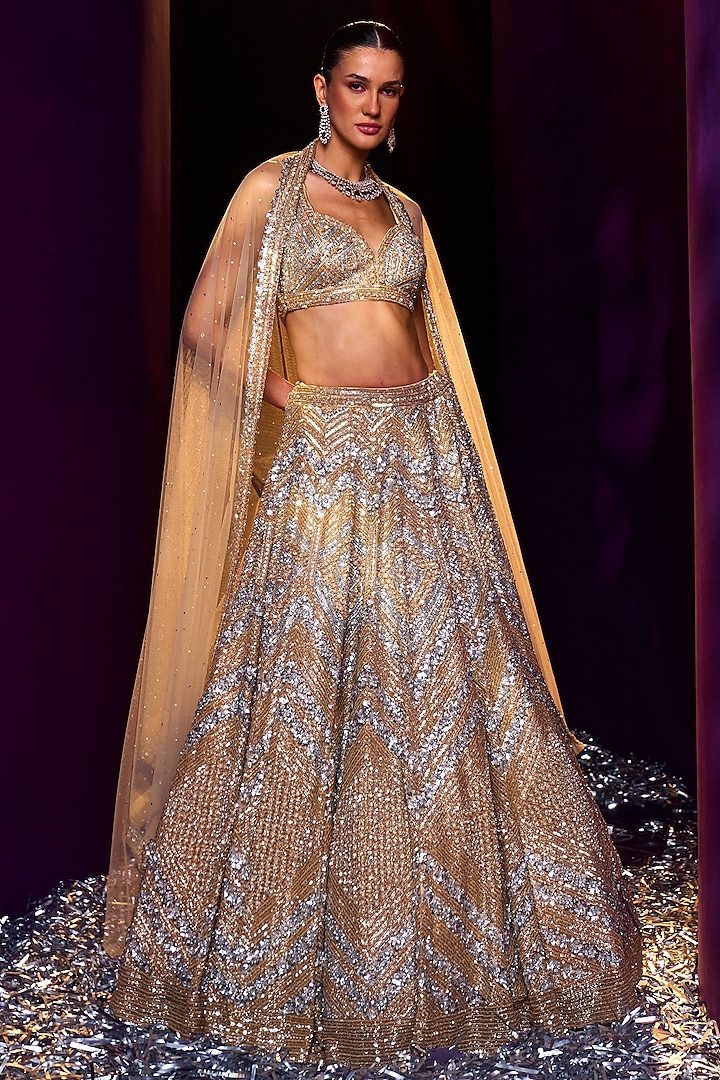 Gold Net Sequins & Crystal Embroidered Bridal Lehenga Set by Angad Singh at Pernia's Pop Up Shop