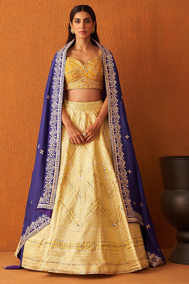 Yellow Raw Silk Embroidered Wedding Lehenga Set by Angad Singh at Pernia's Pop Up Shop