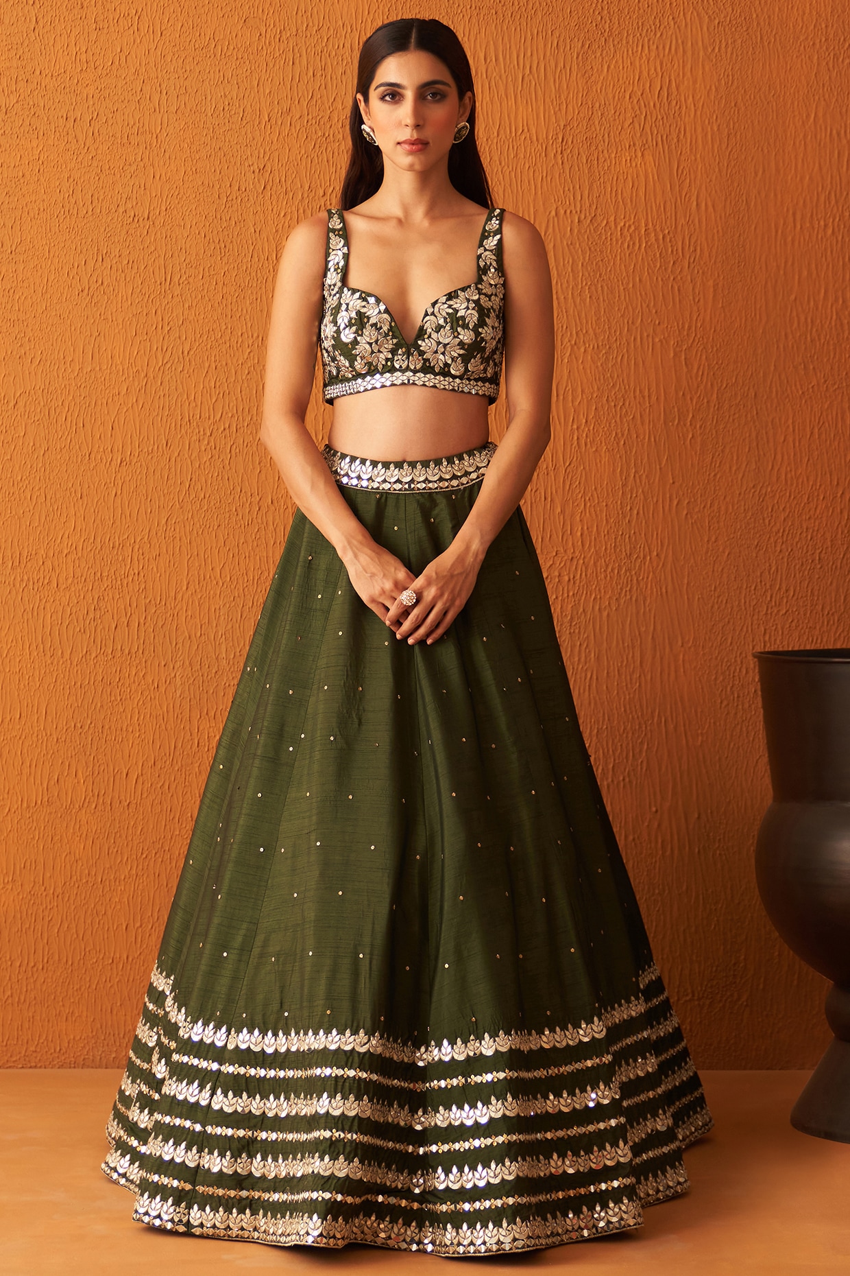 Forest green pleated lehenga with an organza embroidered blouse paired –  Issa Studio