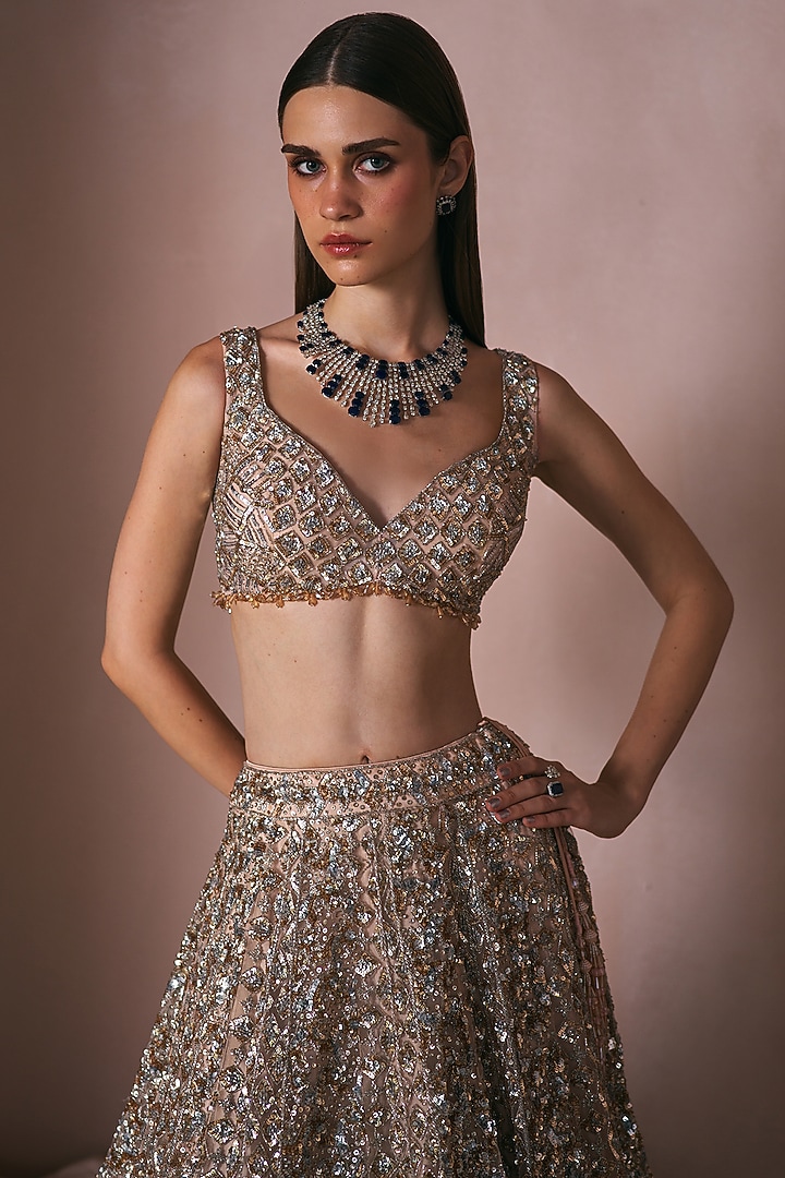 Champagne Gold Net Sequins Embroidered Bridal Lehenga Set by Angad Singh at Pernia's Pop Up Shop