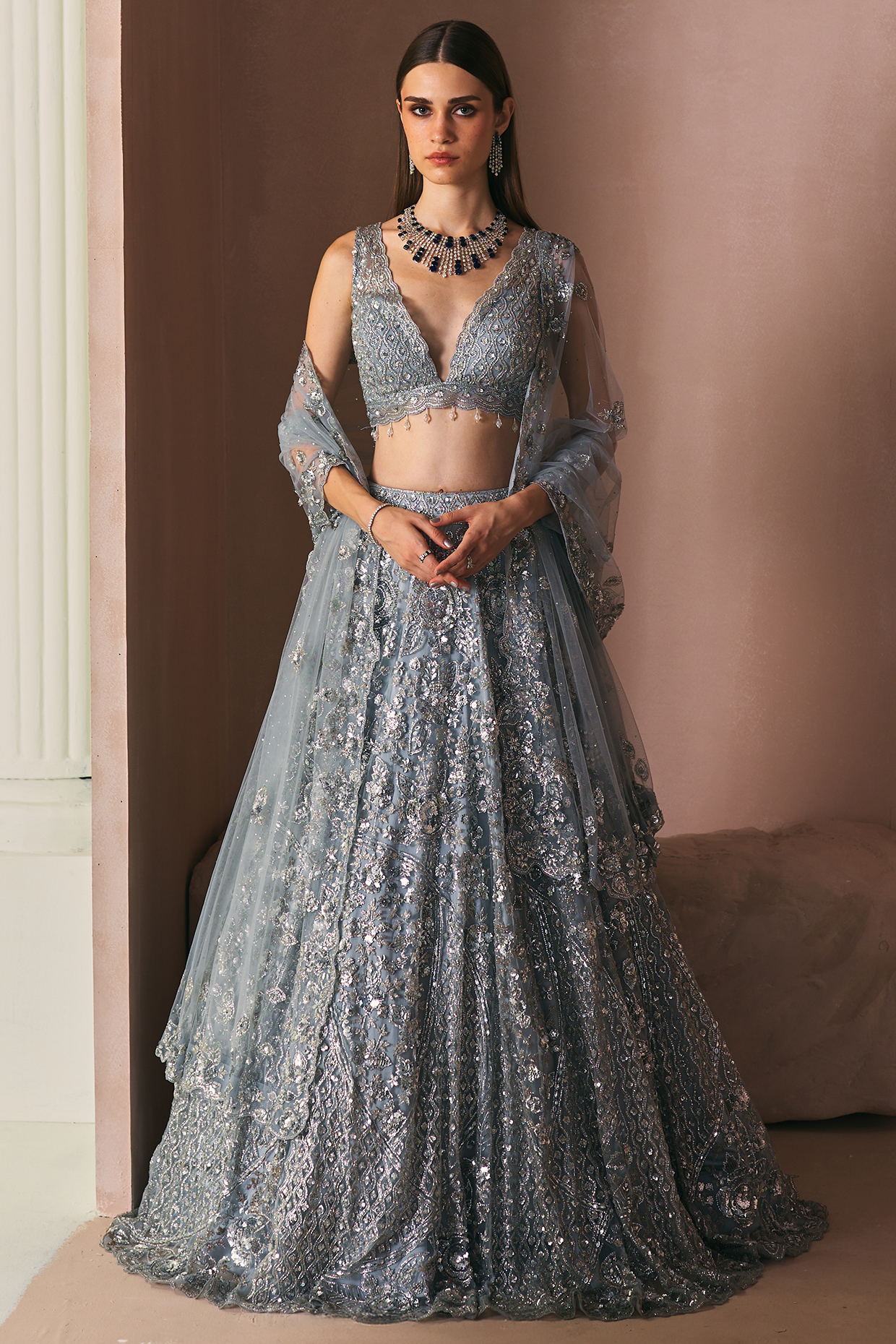 Ice Grey Net Cutdana & Sequins Embroidered Bridal Lehenga Set by Angad Singh at Pernia's Pop Up Shop